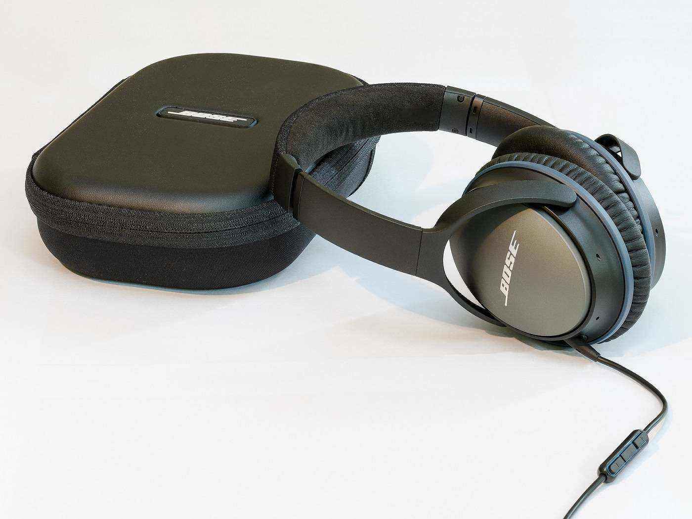 Noise-cancelling headphones with carrying case